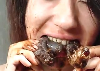 Attractive Japanese babe eats seafood but in a sexualized fashion