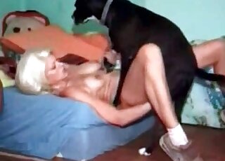 Hot blond MILF loves that zoo fucking action with her dog at home