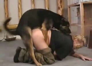 Big booty lady in khaki pants getting fucked by her dog from behind