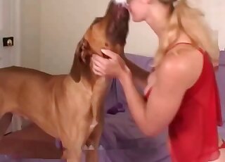 Masked blonde exchanged kisses with dog before getting pussy licked