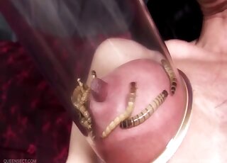 Vacuum pump and worms are applied to the girl's nipple