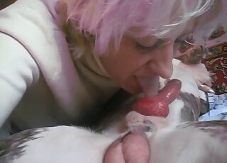 Mature broad is filmed by husband while deepthroating stiff dog cock