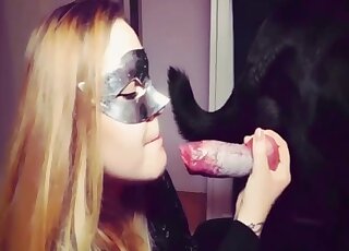 Blonde hussy is sucking and draining dog dick into glass