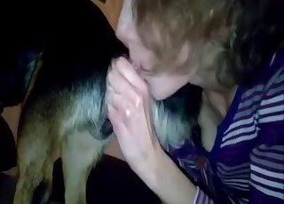 Clothed amateur woman filmed throating the dog dick like crazy