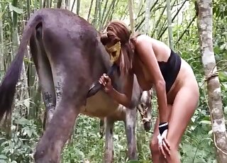 Redhead with big tits throats tasty horse penis in sloppy outdoor XXX