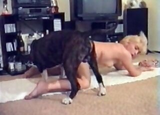 Blonde bends down in front of a dog to star the wild zoo porn