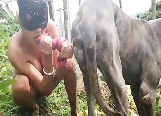Leather mask lady enjoying deep outdoor fucking with a beast
