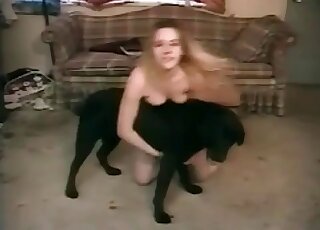 Playful bimbo invites her dog to sniff at her soaking pussy