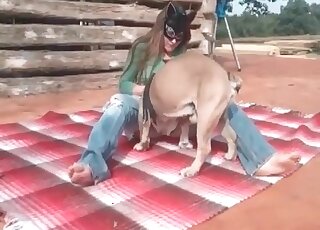Mature blows her dog’s dong and gives the animal her needy cunt