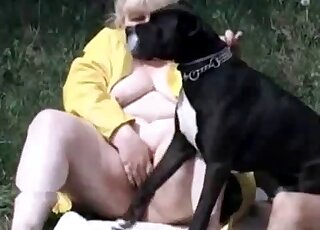 Fat MILF is doing her best to seduce her dog for a fucking session