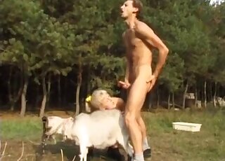 Blonde with a sexy face enjoys a zoophilic threesome with a goat